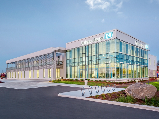 Modern industrial building with glass façade.